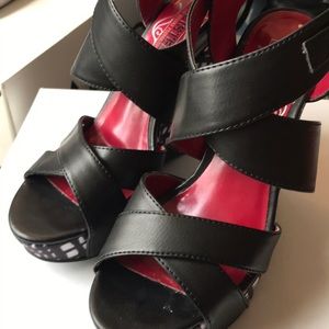 Unlisted women’s black print wedge sandals